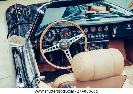 Retro interior of old automobile Royalty-Free Stock Photo #274868666