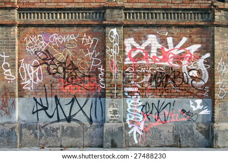 Old Brick Wall with lots of Graffiti