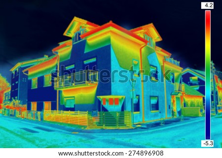 Infrared thermovision image showing lack of thermal insulation on House Royalty-Free Stock Photo #274896908