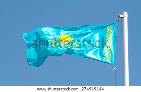 Flag of Kazakhstan against the sky