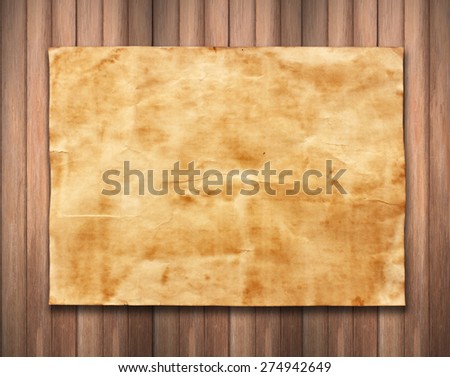 old paper on wood background texture.