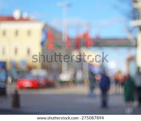 Blurred city sidewalk