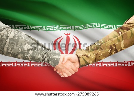 Soldiers shaking hands with flag on background - Iran