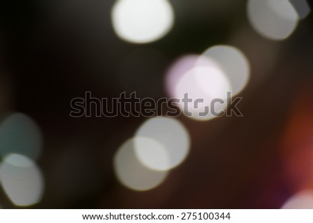 Blurred defocused lights background of city at night
