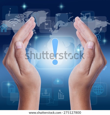 Hand showing exclamation sign icon on screen. business concept