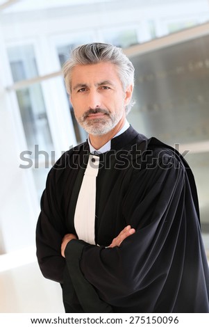 Portrait of lawyer standing in courthouse corrridor