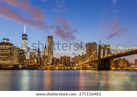 Brooklyn bridge and downtown New York City at night.