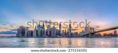 New York City Manhattan downtown skyline and Brooklyn bridge.