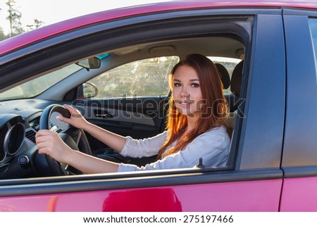Portrait of beautiful girl in the car. soft light