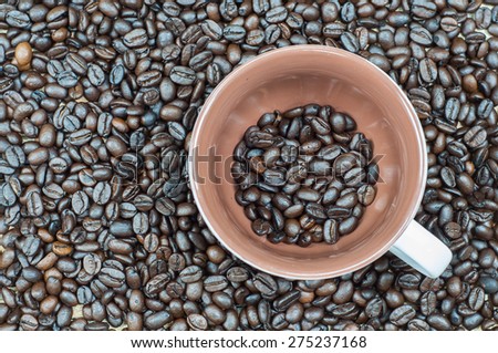 Coffee in a cup on  wooden background