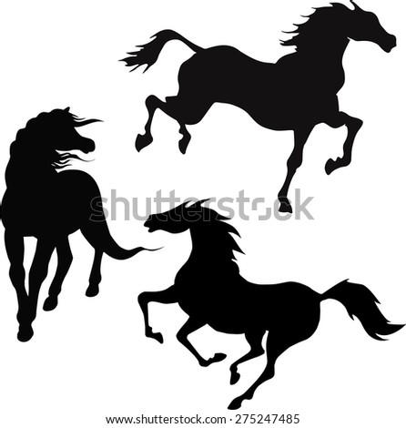 black silhouettes of running horses