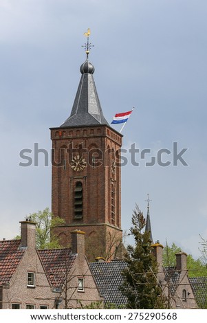 Dutch flag waving in the wind, during liberation day, from a church tower over the village of Scherpenzeel, The Netherlands.
Photo taken on May 05, 2015