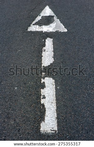 road sign arrow on the pavement
