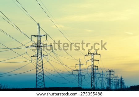 Landscape With Power Line In The Evening, cross-processing effect Royalty-Free Stock Photo #275355488