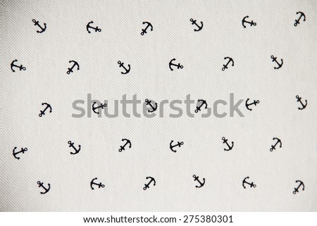 White fabric with anchor repeating pattern