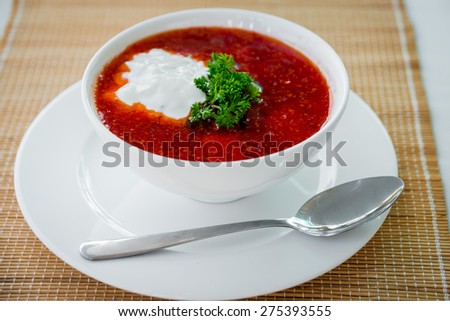Red soup with sour cream. Restaurant