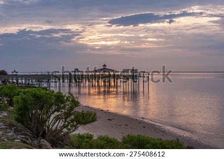 Sunrise at Southport, NC/ Southport Shoreline Royalty-Free Stock Photo #275408612