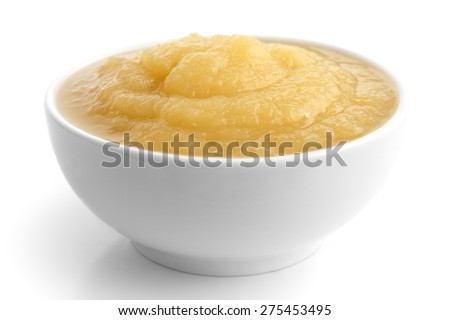 White ceramic dish of apple sauce on white. Royalty-Free Stock Photo #275453495