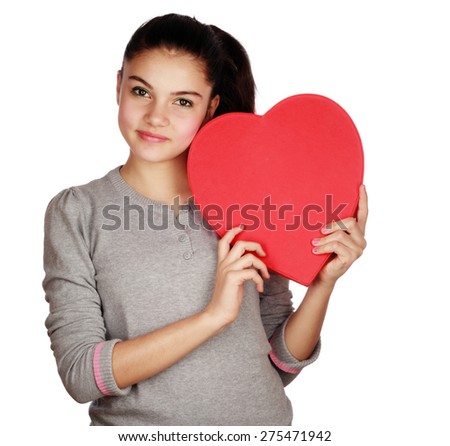 Young girl with red heart box