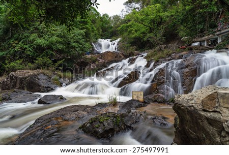Waterfall cascade in Dalat in Vietnam. Long exposure photography of water