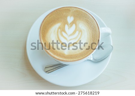 Hot cup of coffee latte, stock photo