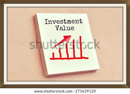 Text investment value on the graph goes up on the short note texture background