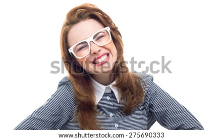 Woman showing gritted teeth, isolated on white background. Portrait of a girl looking at camera, studio shot