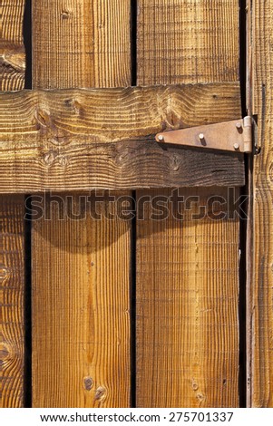 Wooden door with rusty hinges, high resolution texture background image
