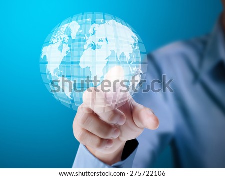 Business man pressing a touchscreen button