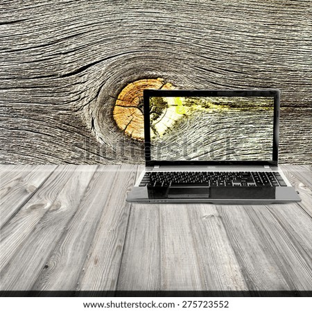 laptop on a wooden background