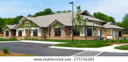 Newly constructed small suburban building Royalty-Free Stock Photo #275726285