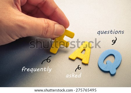 Hand arrange wood letters as FAQ abbreviation ( frequently asked questions ) Royalty-Free Stock Photo #275765495