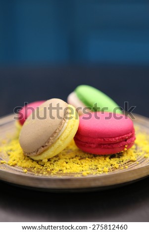 colorful macarons On Wooden background