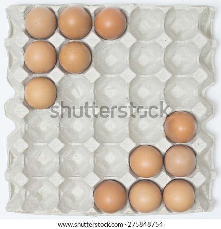 egg in paper tray with pattern.