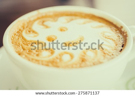 Latte art coffee cup in white mug - vintage effect style pictures