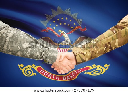 Soldiers handshake and US state flag - North Dakota