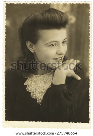 USSR - CIRCA 1940s: Studio portrait of a beautiful young woman , circa 1940s