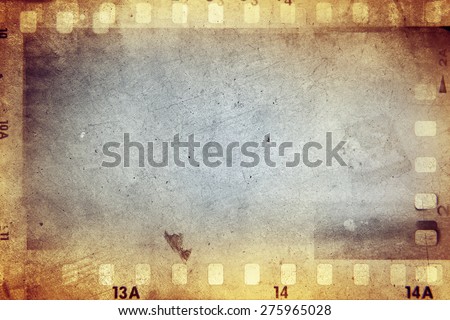 Film negative frames on brown background