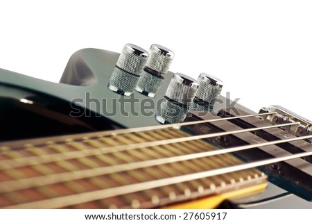 Close up of a green bass guitar isolated on white