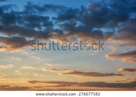 Clouds on blue sky at sunset