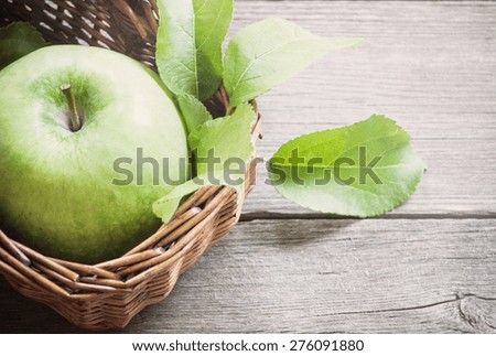 green apple on wooden background