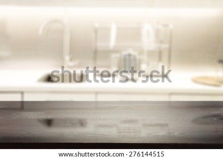 black desk and white kitchen 