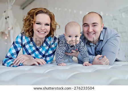 Portrait of the family. Father, mother and child