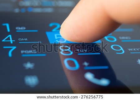 Making a dial on a smartphone, close up Royalty-Free Stock Photo #276256775