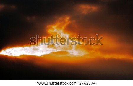 Sun rays shining through the cloud