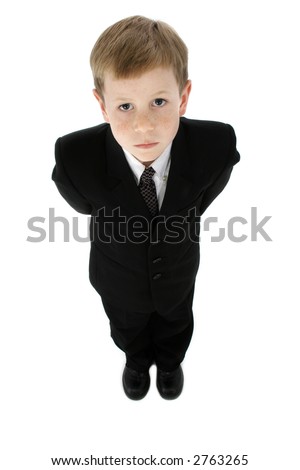 Little boy dressed in a suit; full body, on white background