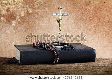 Vintage still life crucifix and Bible