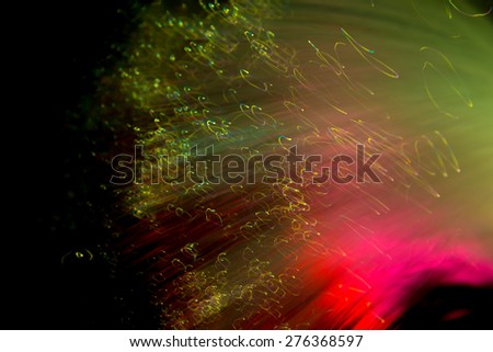 Abstract Light painting, Green tone on black background -  long exposure time lapse and technique and blurred picture style