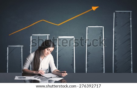 Successful businesswoman with positive growth business diagram in background

