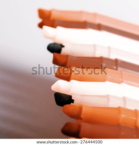 Group of felt tip bright color markers on white background